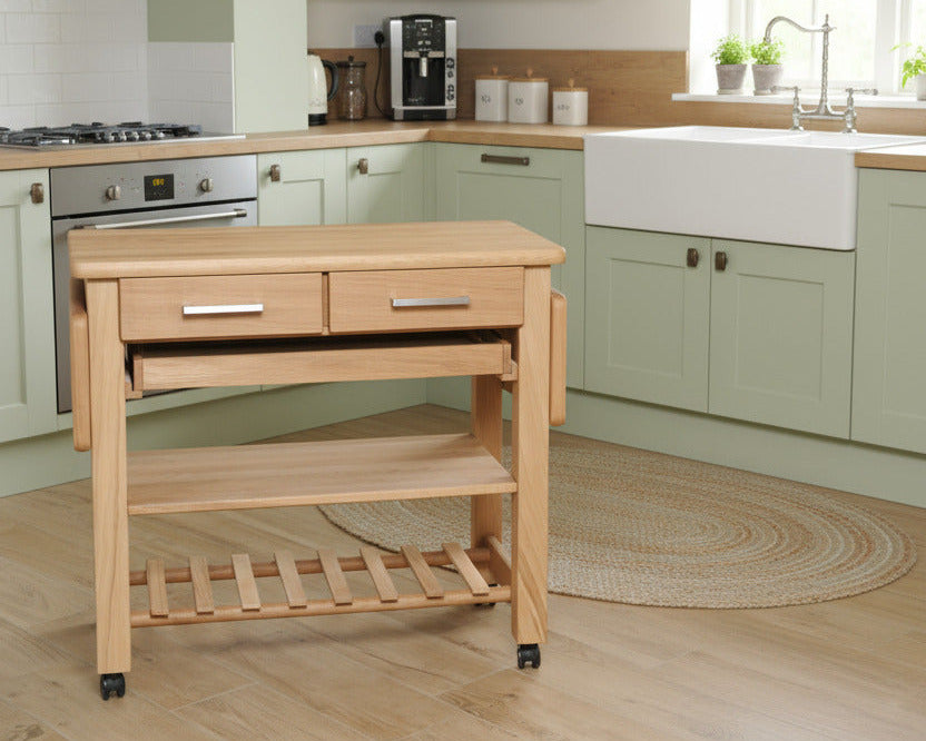 Küchenwagen Mobil 2 aus massiver Eiche. 90 x 50 x 81 cm mit Seitenklappen (Breite x Tiefe x Höhe) mit 2 Schubladen,Tablett, einem Boden und Flaschenablage, Seitenklappen zum ausklappen auf 140cm Breite