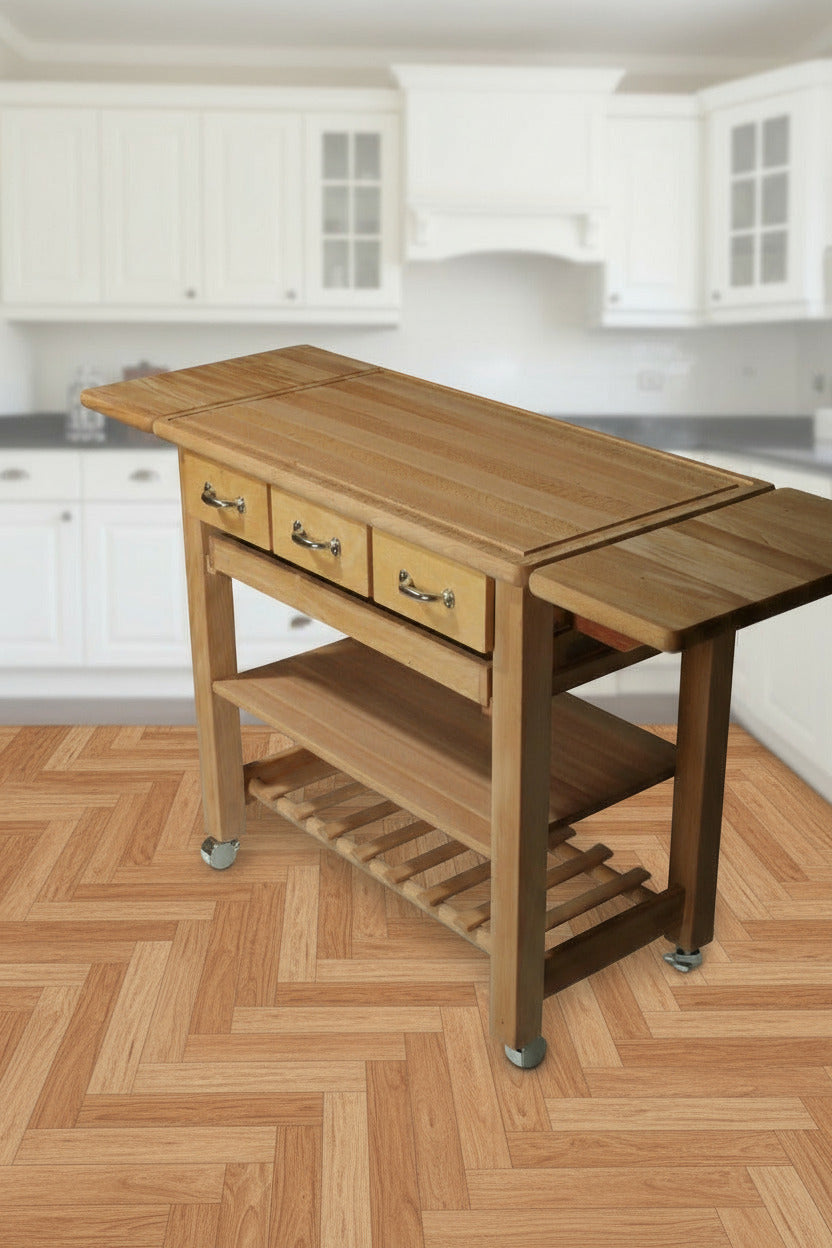 Küchenwagen Mobil 3 aus massiver Buche. Basismodell 90 x 50x 81 cm mit Seitenklappen (breite x Tiefe x Höhe) mit 3 Schubladen, einem Boden, Flaschenablage, Seitenklappen und Tablett zum ausklappen auf 140cm Breite