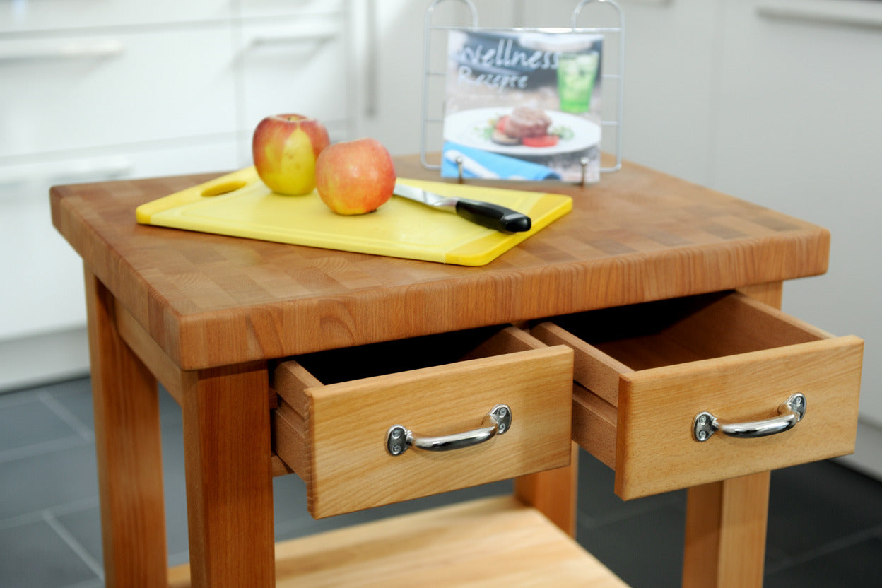 Küchenwagen Mobil 4 aus massiver Buche. 64 x 50x 83cm (Breite x Tiefe x Höhe) mit 4.8cm Hirnholzplatte, 2 Schubladen, einem Boden und Flaschenablage