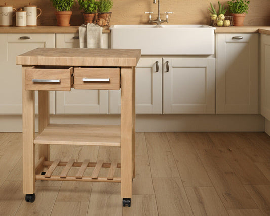 Küchenwagen Mobil 4 aus massiver Eiche. 64 x 50x 83cm (Breite x Tiefe x Höhe) mit 4.8cm Hirnholzplatte, 2 Schubladen, einem Boden und Flaschenablage