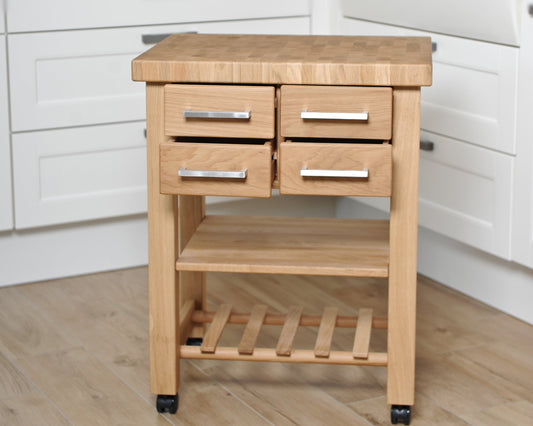 Küchenwagen Mobil 5 aus massiver Eiche. 64 x 50x 83cm (Breite x Tiefe x Höhe) mit 4.8cm Hirnholzplatte, 4 Schubladen, einem Boden und Flaschenablage