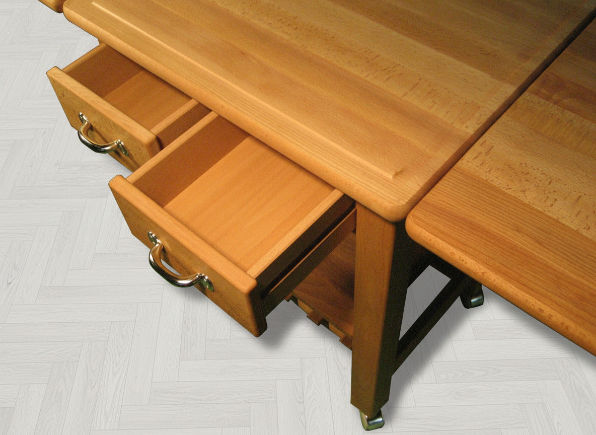 Küchenwagen Mobil 9 aus massiver Buche. 64 x 50x 81 cm mit Seitenklappen (breite x Tiefe x Höhe) mit 2 Schubladen, einem Boden und Flaschenablage, Seitenklappen zum ausklappen auf 114cm Breite