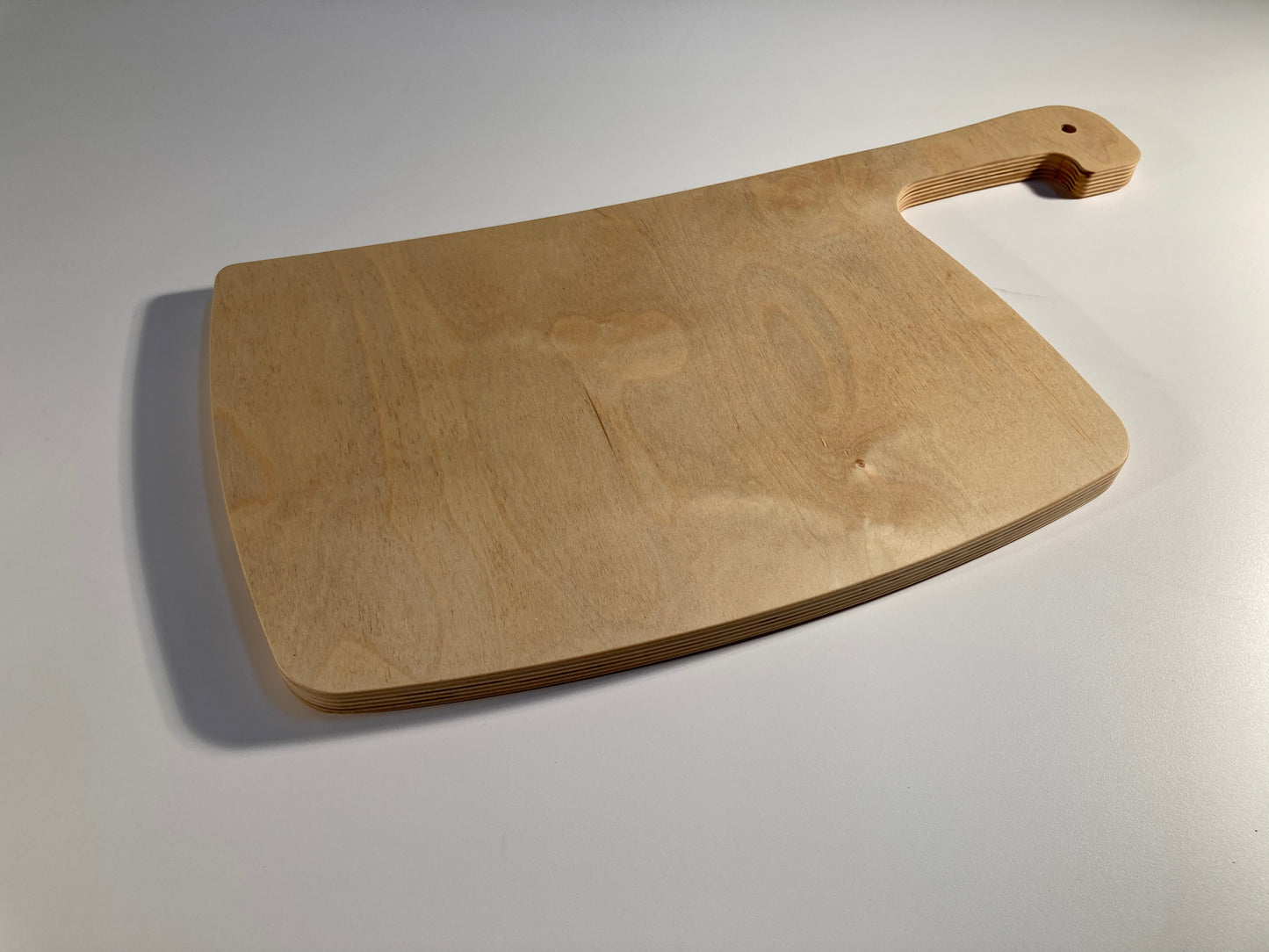 Schneidebrett aus Multiplex Buche geölt in Beilform